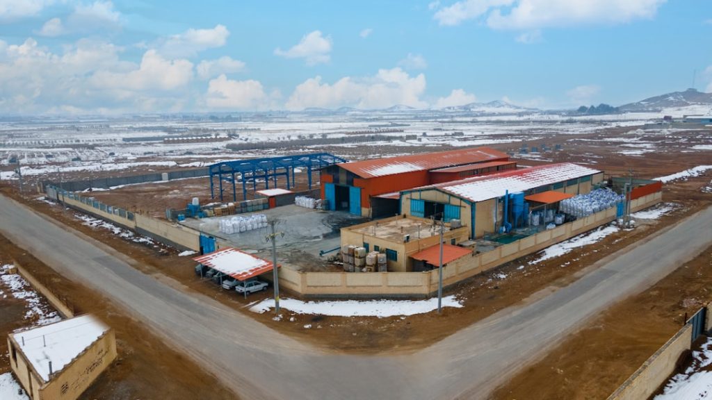 an-aerial-view-of-a-building-in-the-middle-of-nowhere-oyauehqvawe